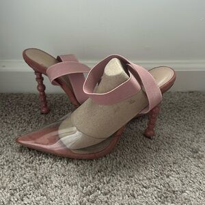 Pointed toe heels. Clear toe box. Fun heel design. Heel height 4.5 inches.